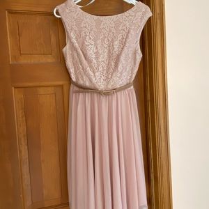 Pink David’s bridal dress size small.
